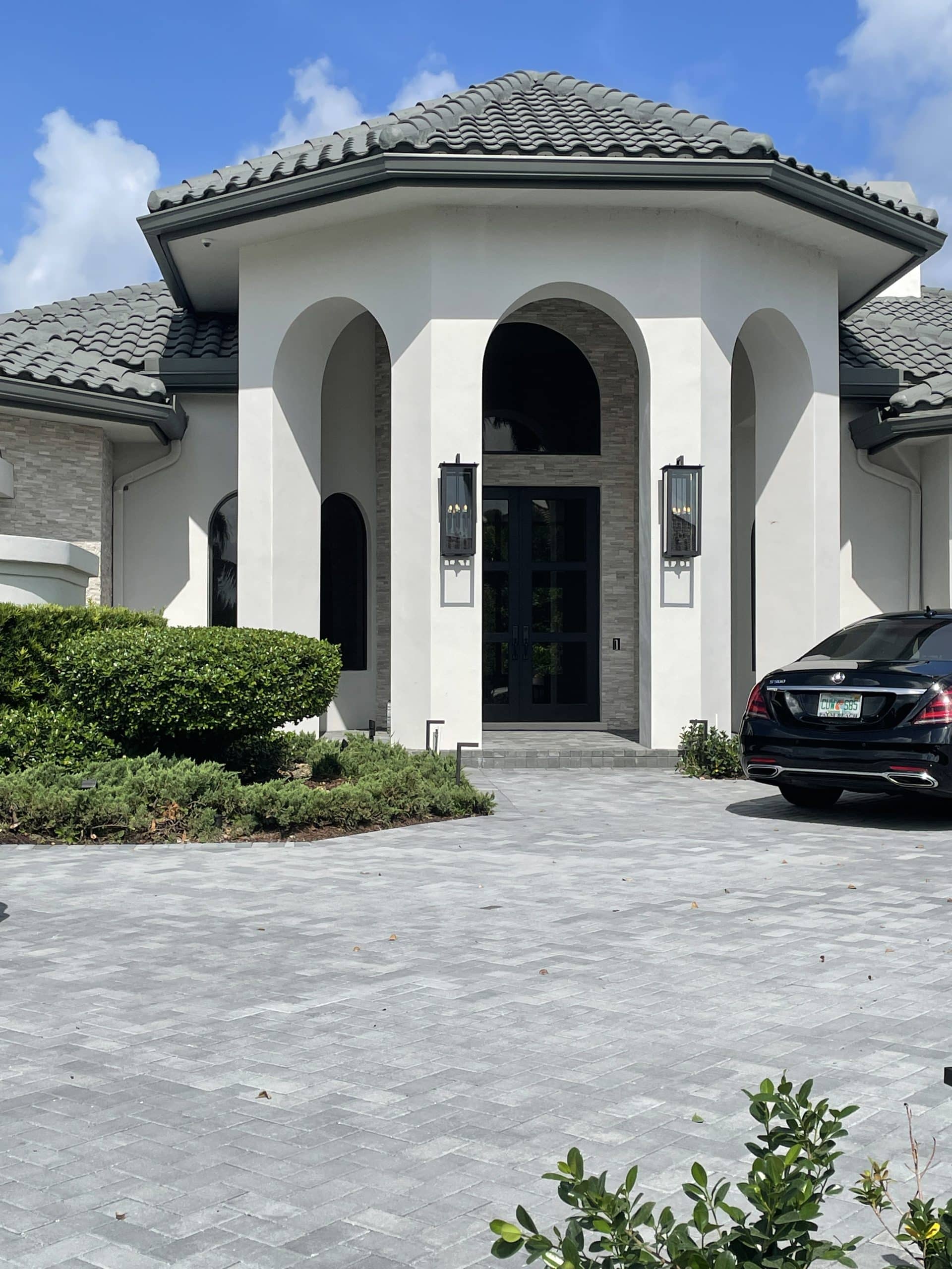 Impact entry doors with glass panels on a residential home